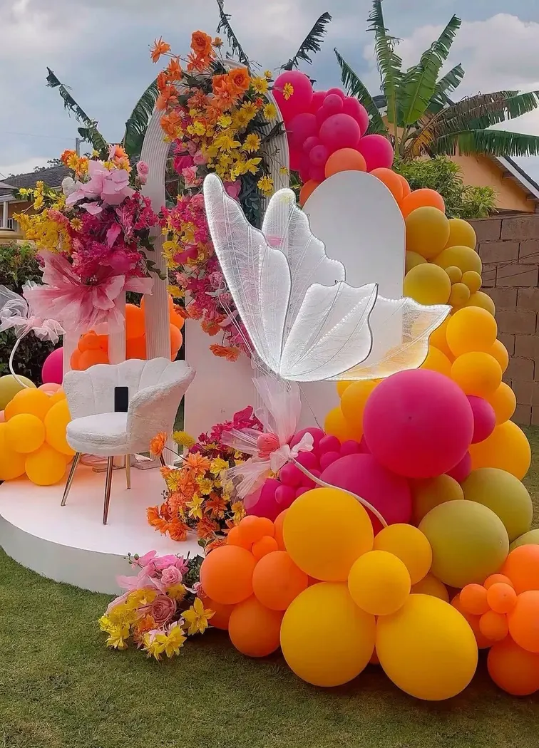 Colourful floral and balloon installation