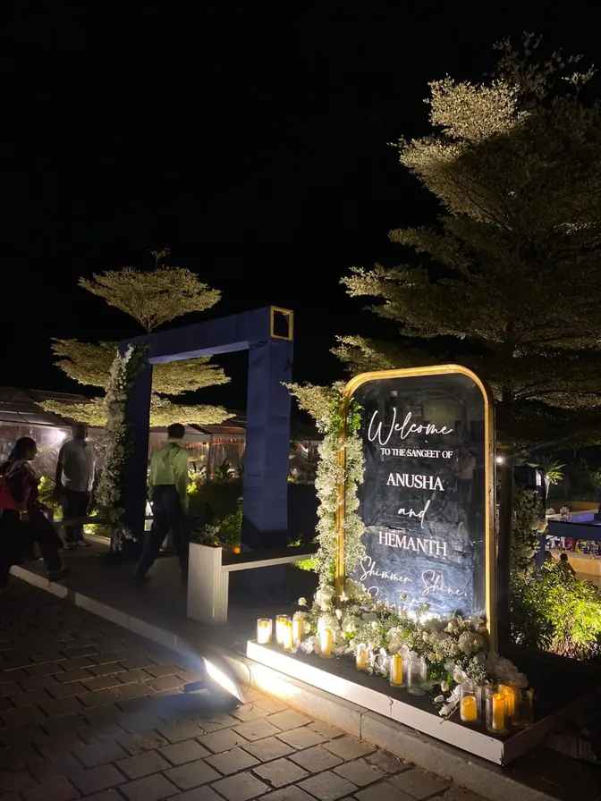 Illuminated welcome board at a venue entrance
